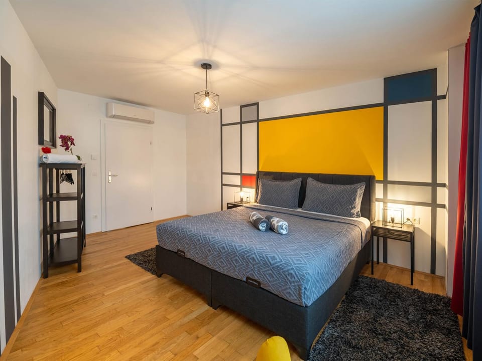Bed, Decorative detail, Bedroom, towels, wardrobe, air conditioner
