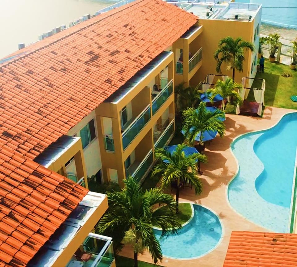 Property building, Day, Pool view, Swimming pool, sunbed
