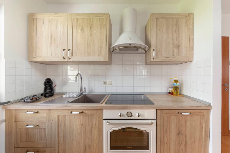 Kitchen or kitchenette, oven, stove