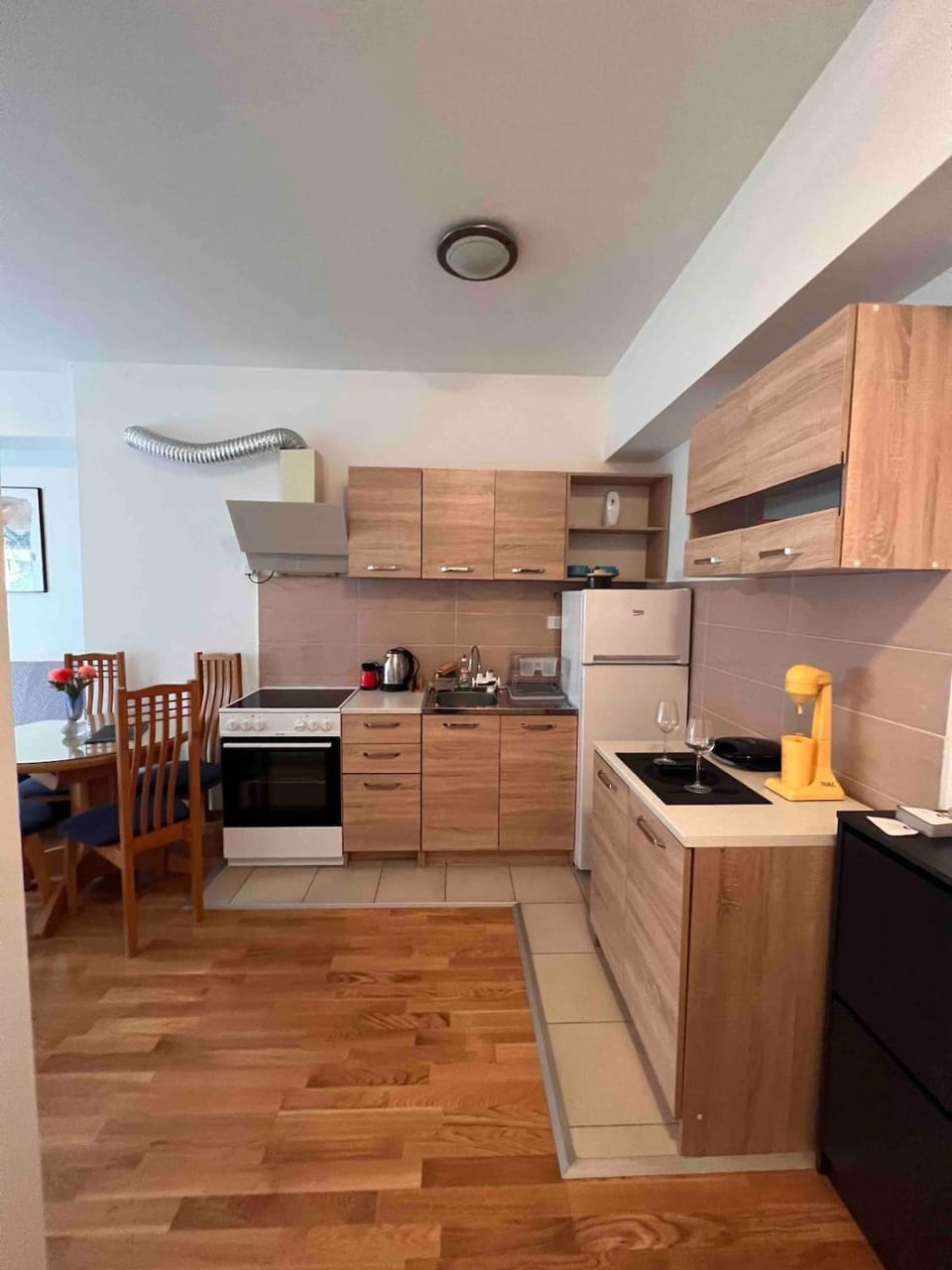 Kitchen or kitchenette, oven, toaster