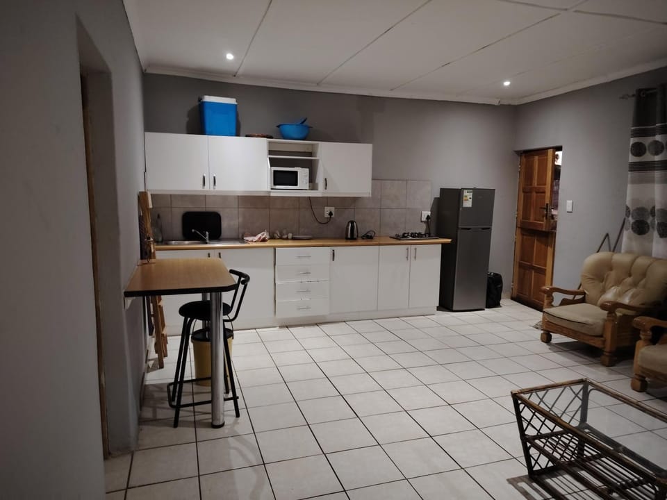 Kitchen or kitchenette, Living room, stove