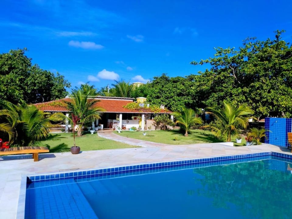 Property building, Day, Pool view, Swimming pool, sunbed