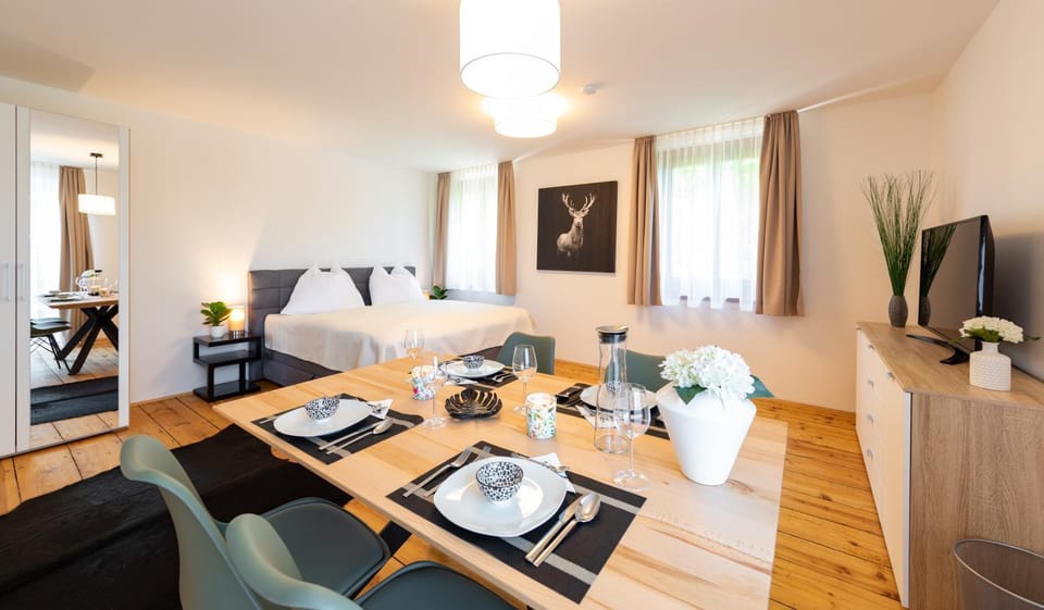 Bed, Living room, Seating area, Dining area