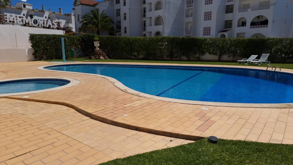 Property building, Swimming pool, sunbed