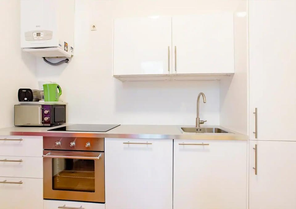 Kitchen or kitchenette, oven, stove, toaster