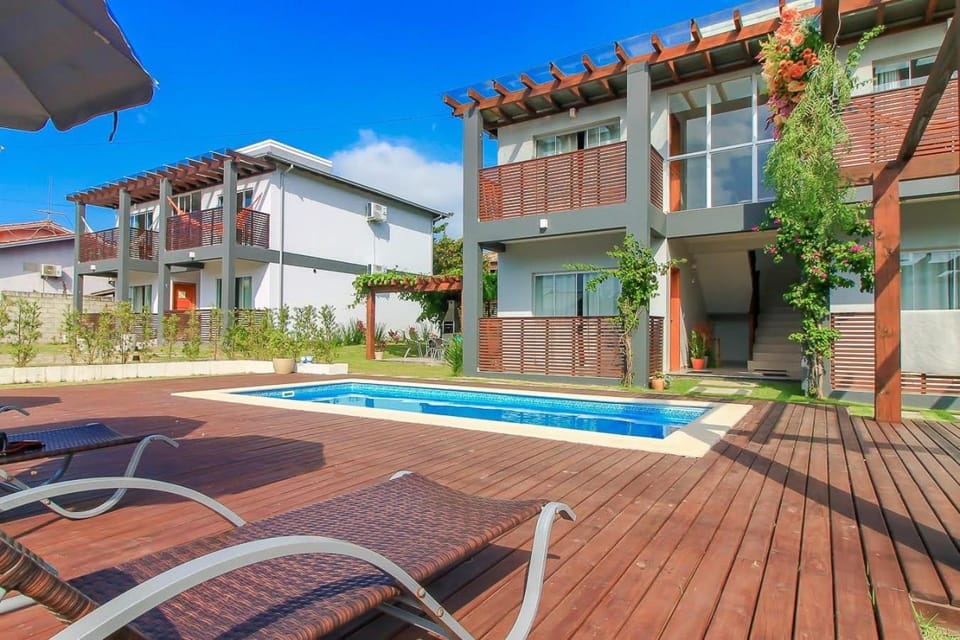 Property building, Patio, Day, Pool view, Swimming pool, sunbed