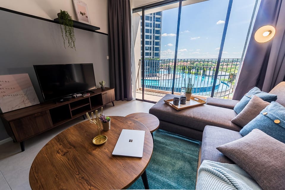 Living room, Seating area, Pool view
