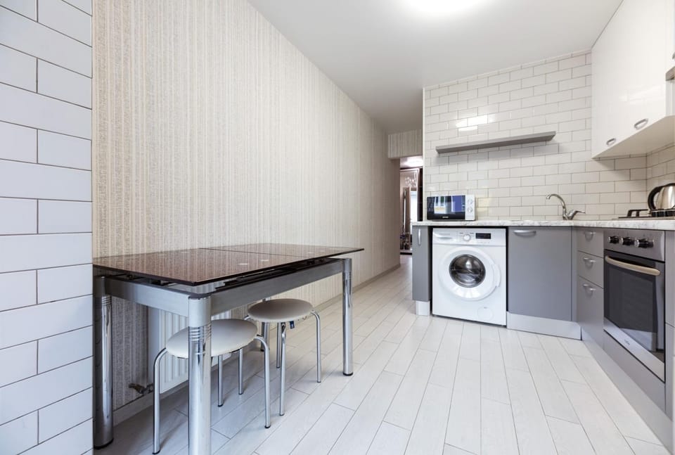 Kitchen or kitchenette, Dining area, oven, stove, washing machine
