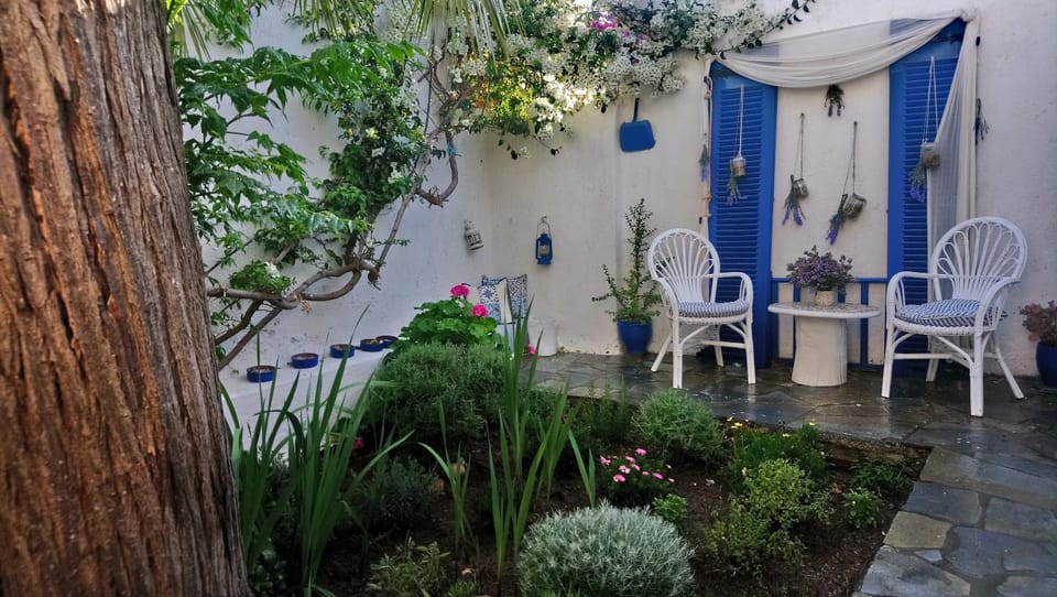 Property building, Patio, Garden, Seating area, Garden view