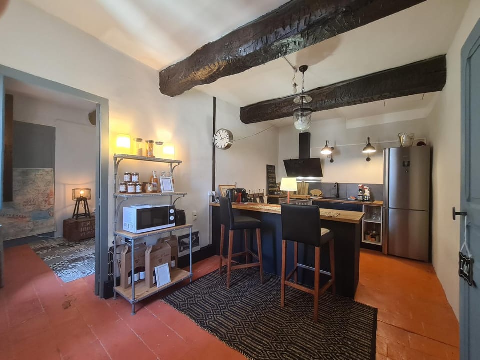 Dining area, microwave, stove, toaster, kitchen