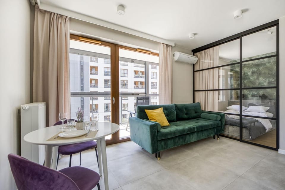 Bed, Living room, Seating area, Dining area