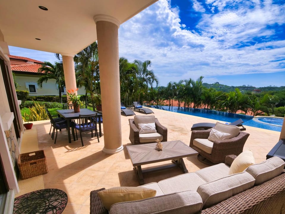 Property building, View (from property/room), Balcony/Terrace, Seating area, Pool view, Swimming pool