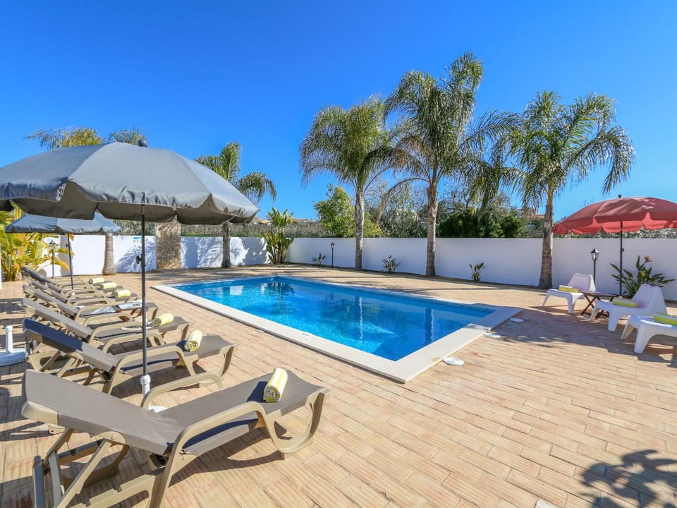 Swimming pool, sunbed
