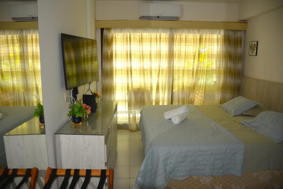 Bed, Photo of the whole room, Bedroom, towels, air conditioner