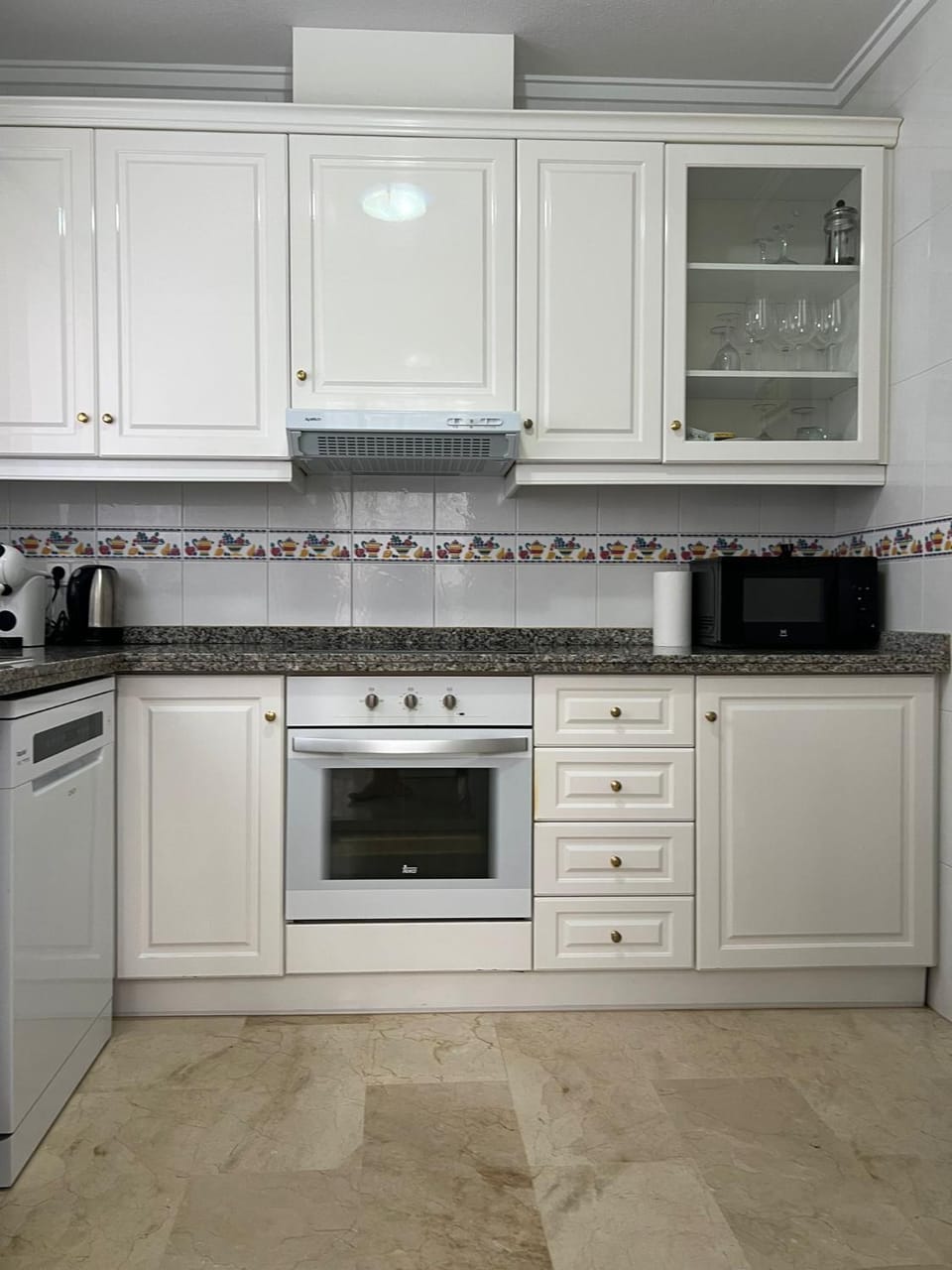 Kitchen or kitchenette, microwave, oven