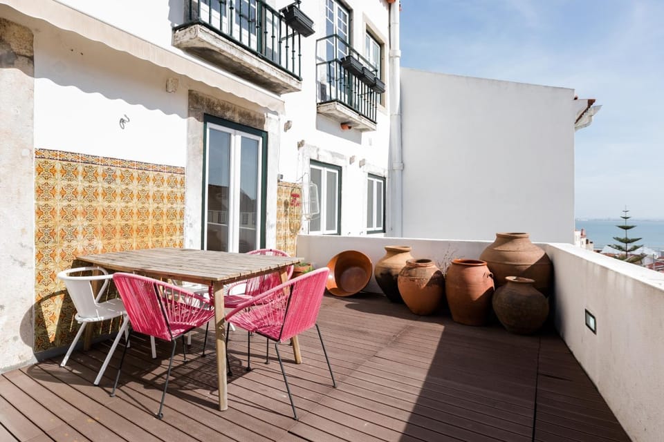 Alfama Terrace Best River and Historic City View Spacious and Charming Ground Floor 18th Century Building Apartment in Lisbon