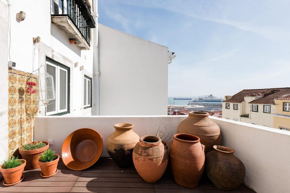 Alfama Terrace Best River and Historic City View Spacious and Charming Ground Floor 18th Century Building Apartment in Lisbon