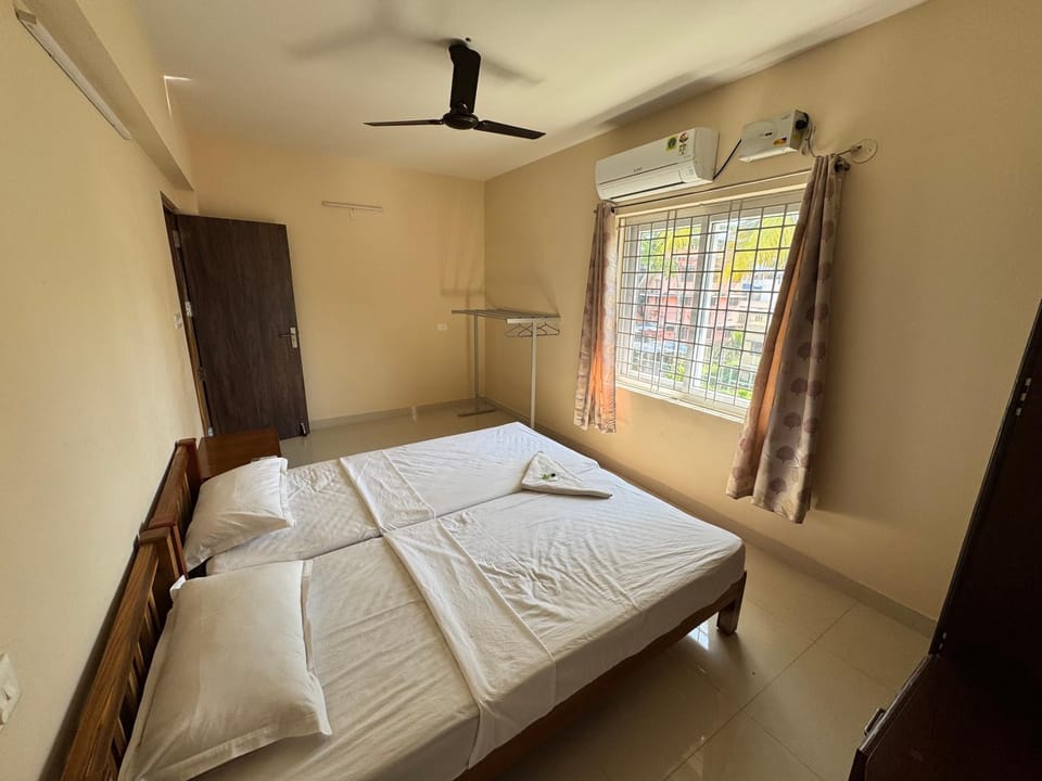 Bed, Photo of the whole room, Bedroom, towels, air conditioner