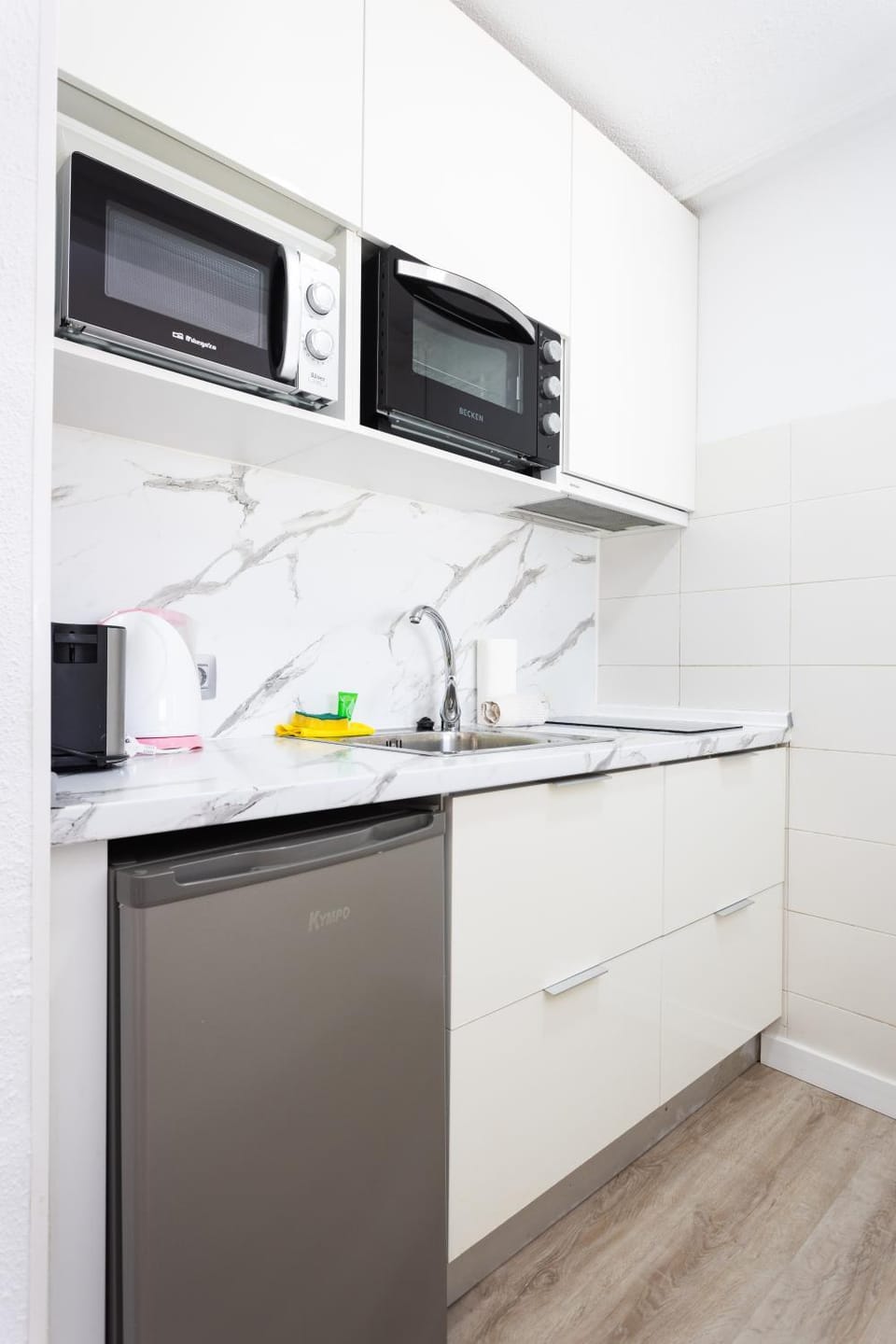 Kitchen or kitchenette, dishwasher, microwave, stove
