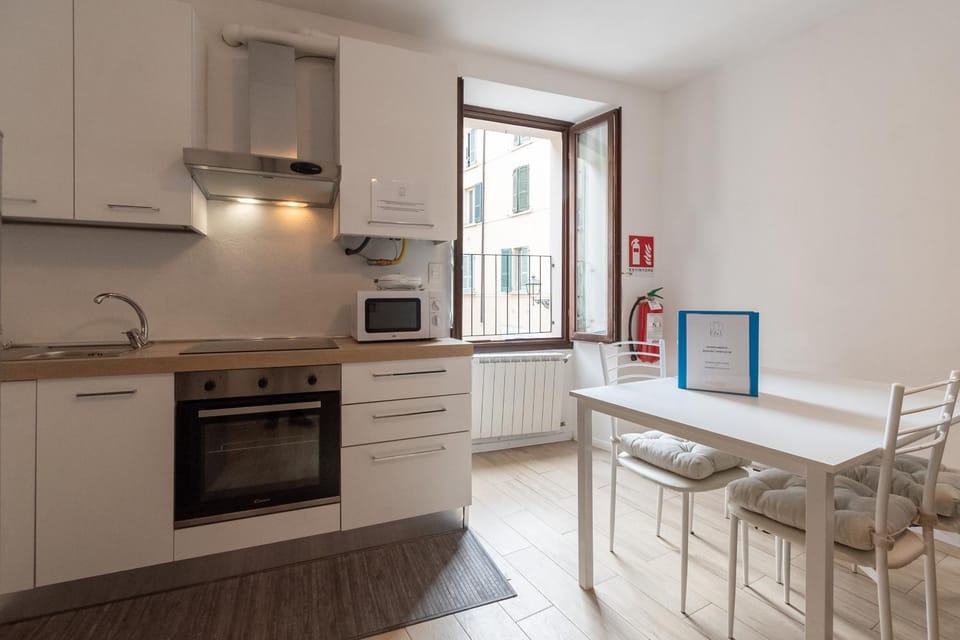 Kitchen or kitchenette, oven, stove, toaster