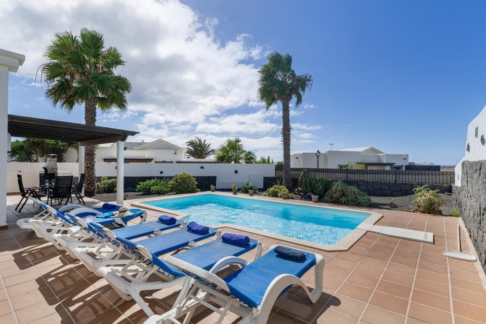 Property building, Living room, Swimming pool
