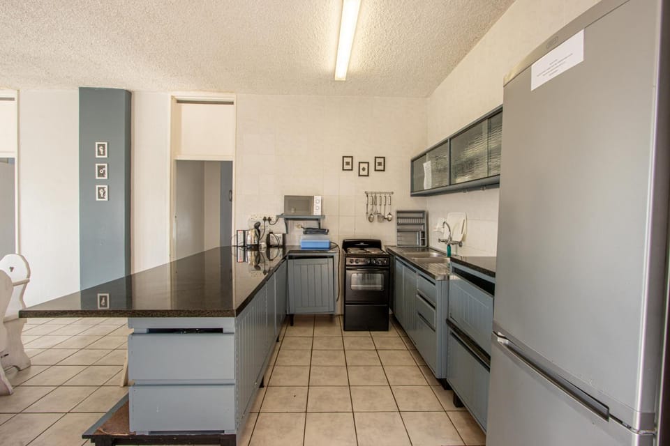 Kitchen or kitchenette, oven, stove, toaster