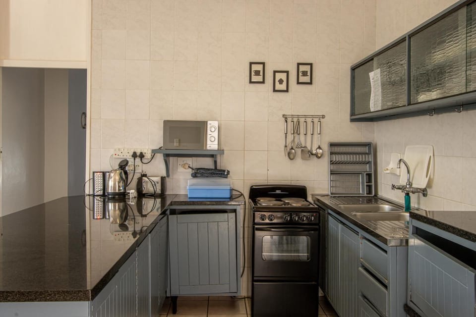 Kitchen or kitchenette, oven, stove, toaster