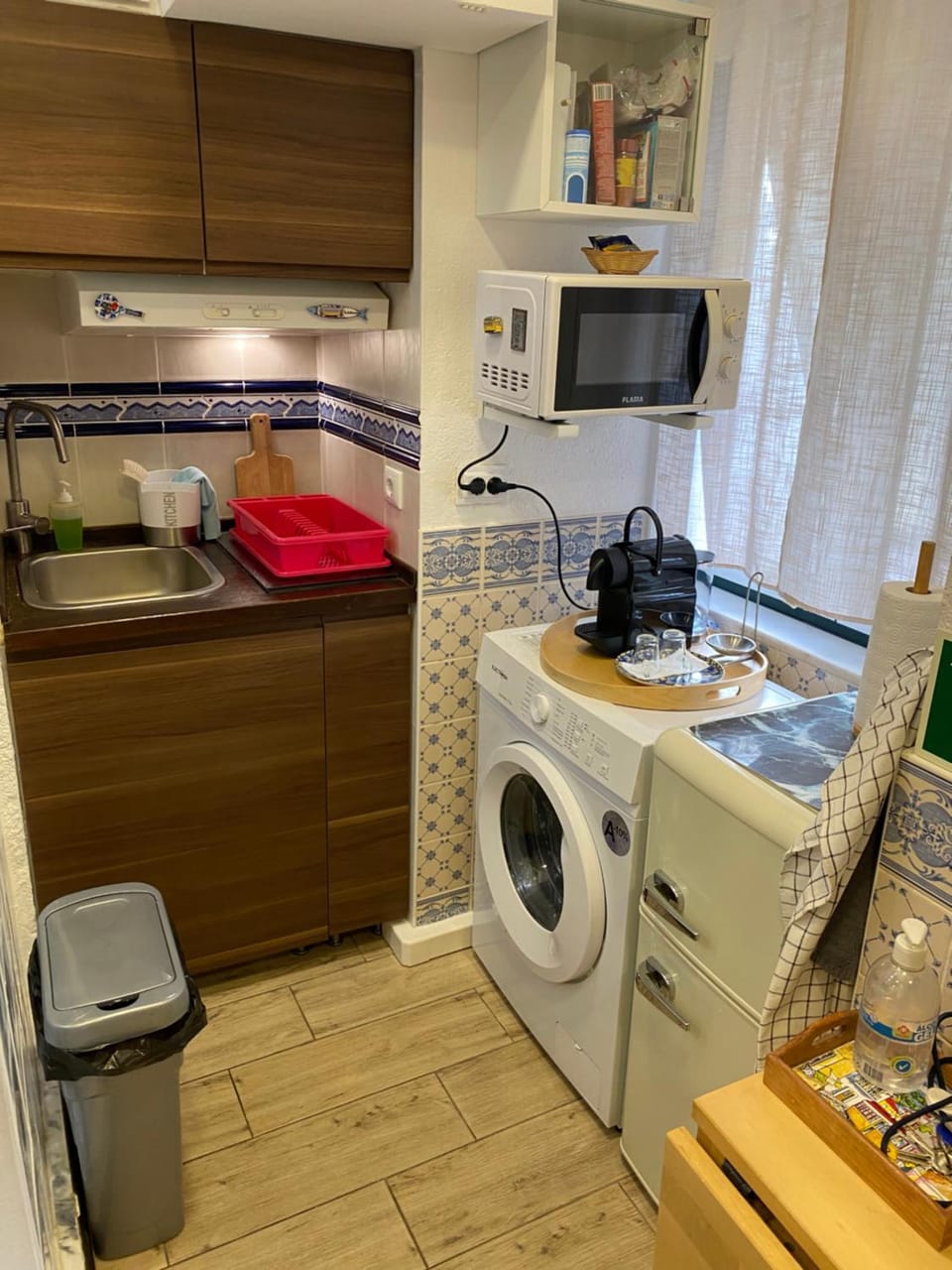 Kitchen or kitchenette, microwave, stove, washing machine, kitchen
