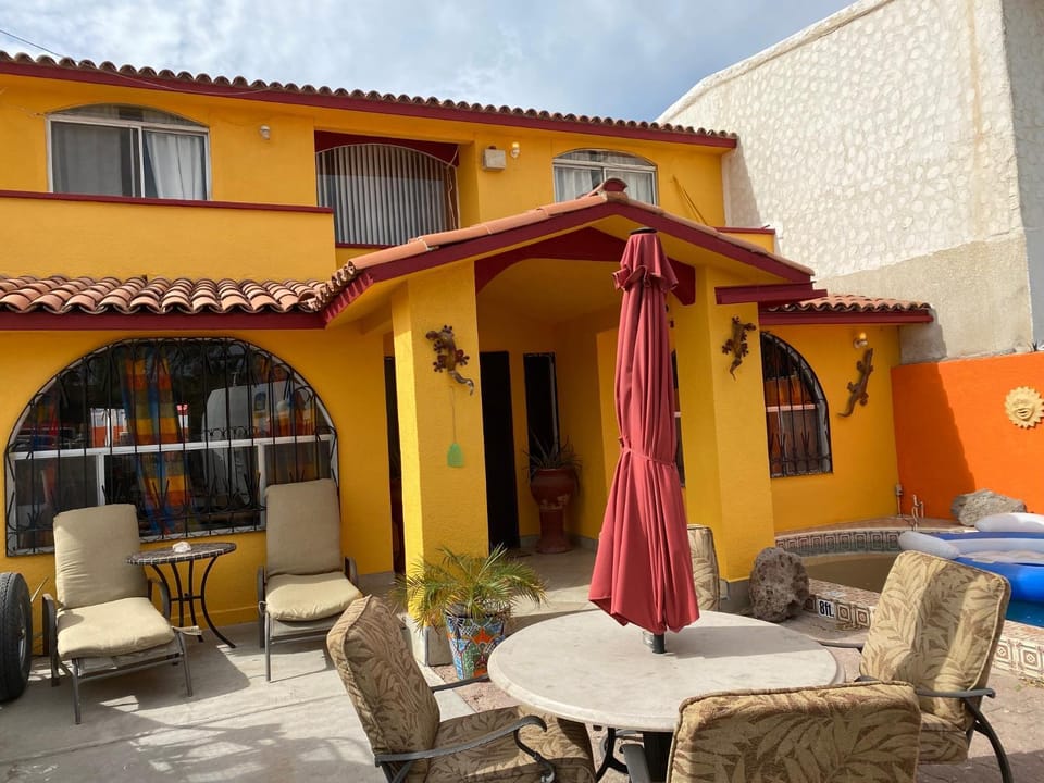 Property building, Patio, Balcony/Terrace, Seating area