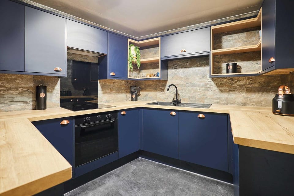 Kitchen or kitchenette, stove, toaster