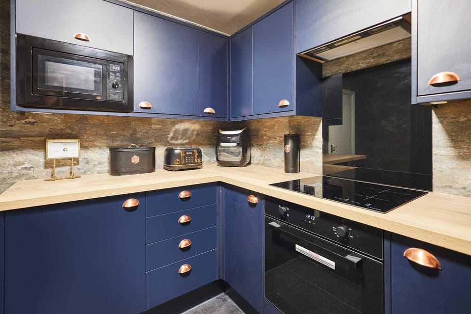 Kitchen or kitchenette, stove, toaster