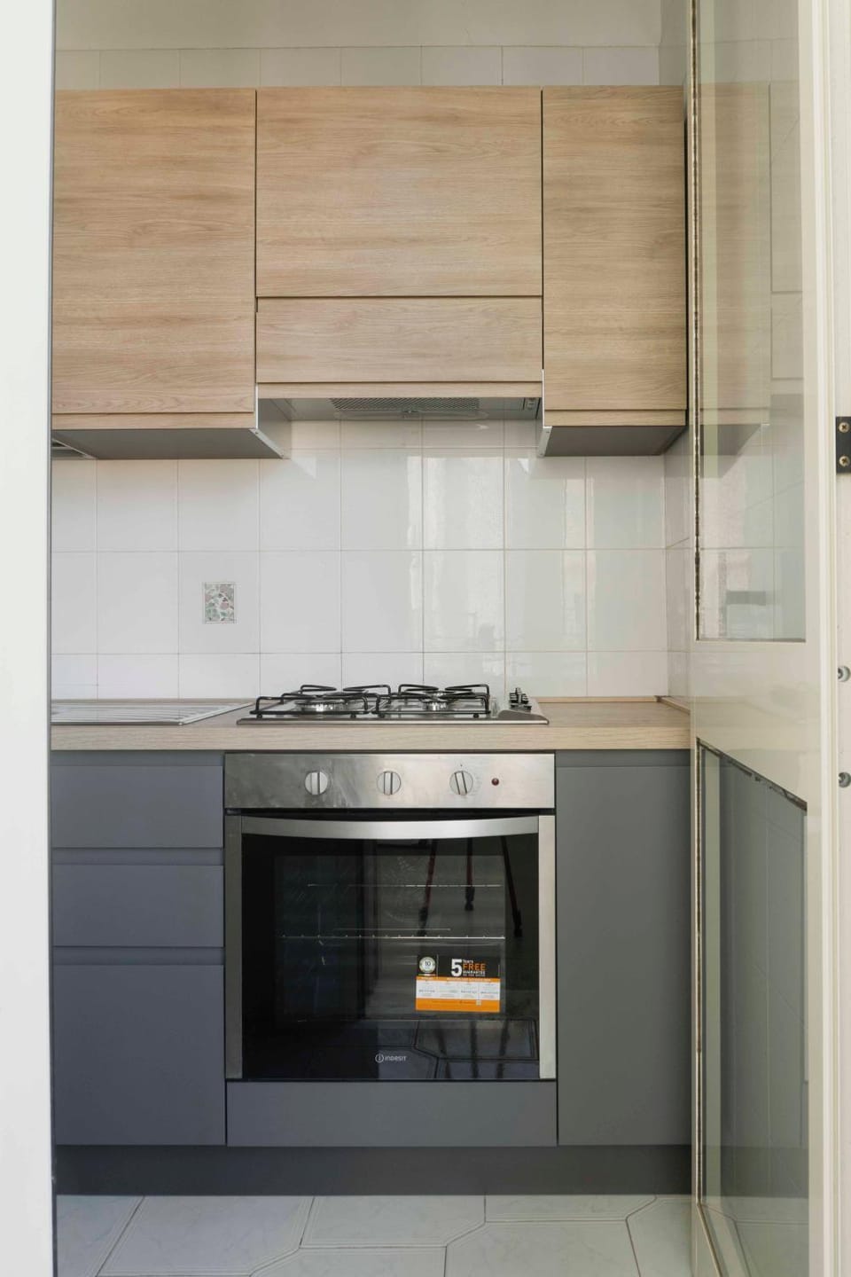 Kitchen or kitchenette, stove