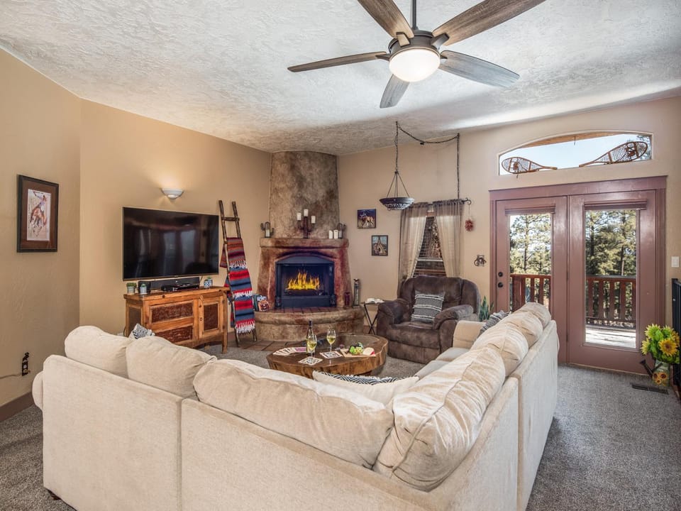TV and multimedia, Living room, Seating area, fireplace, furniture
