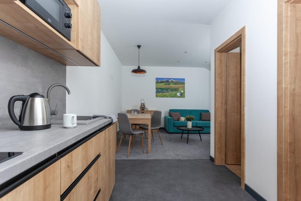Coffee/tea facilities, Kitchen or kitchenette, Seating area, minibar, stove