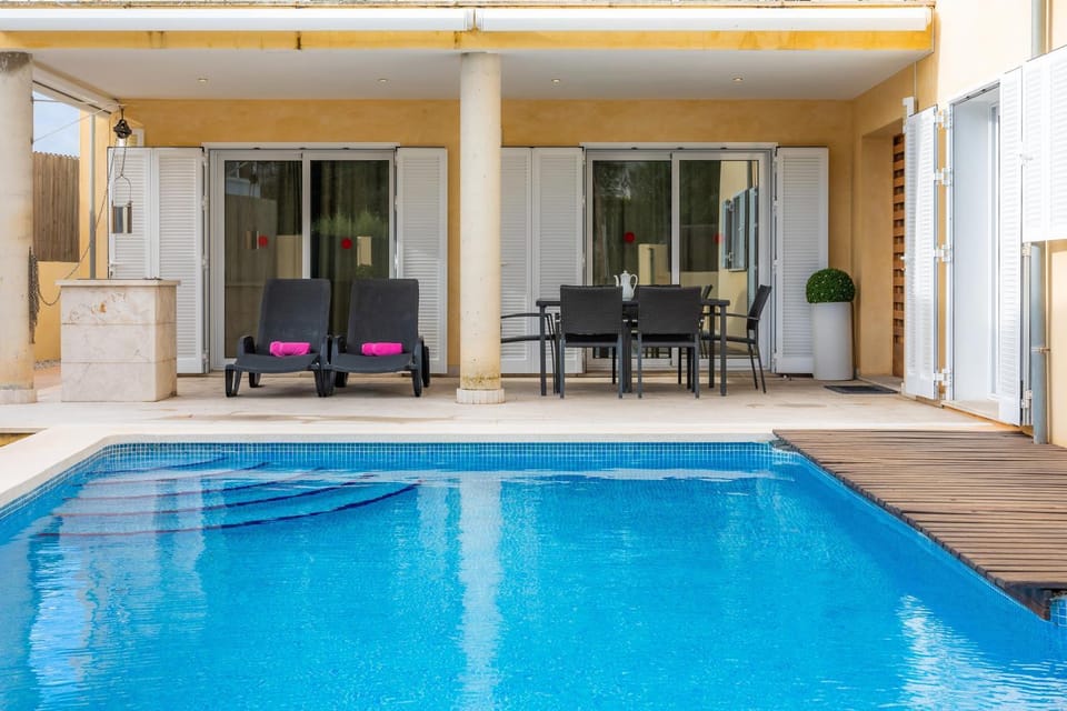 Property building, Living room, Swimming pool
