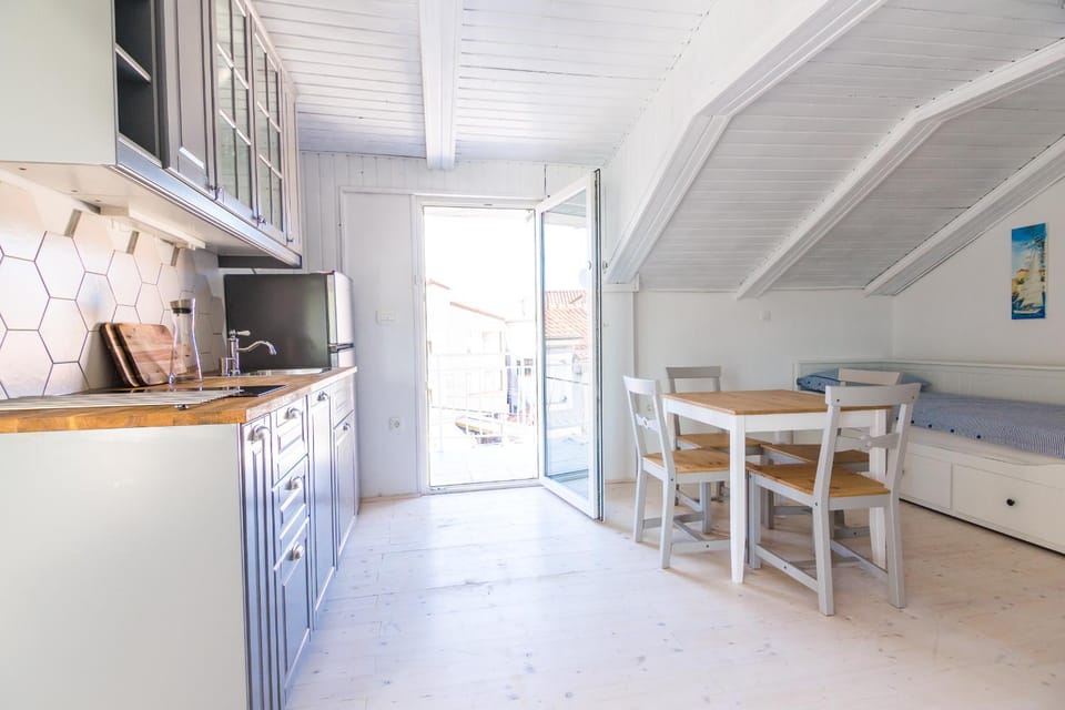 Facade/entrance, Bed, Kitchen or kitchenette, Seating area, Dining area, Street view