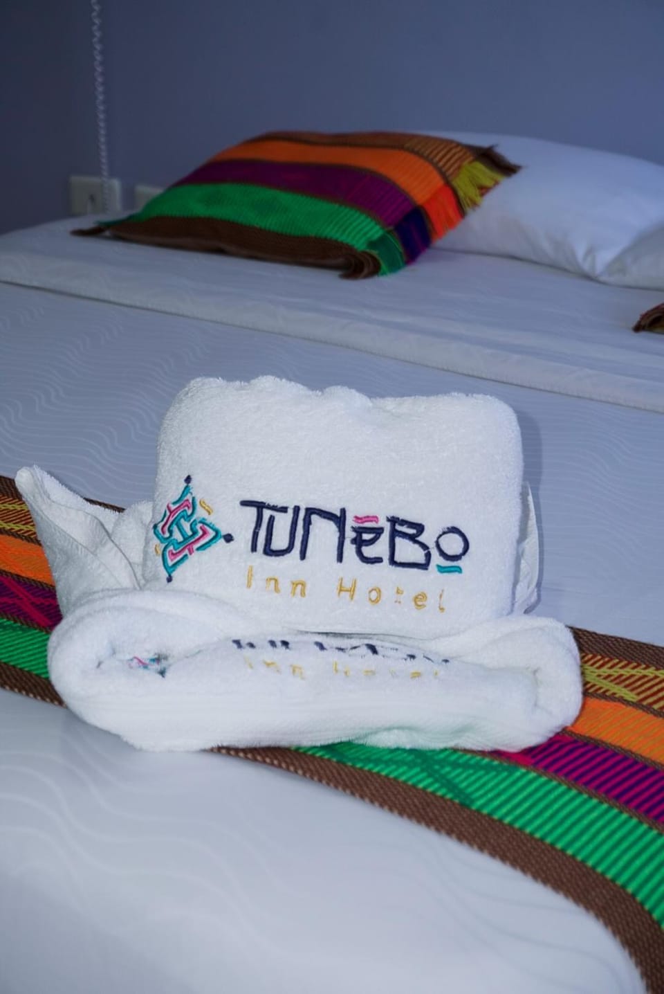 Bed, Property logo or sign, Bedroom, towels