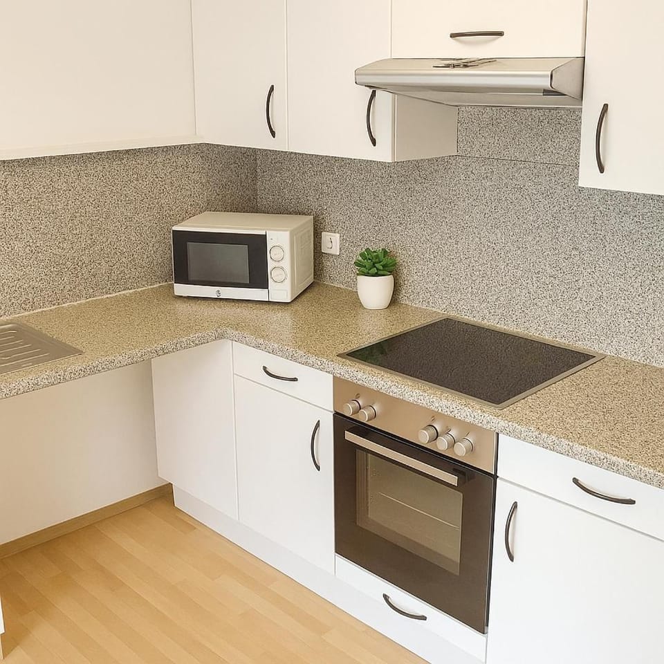 Kitchen or kitchenette, stove