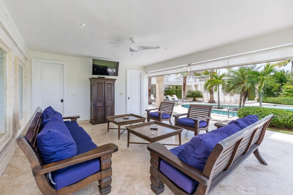 Living room, Seating area, Pool view