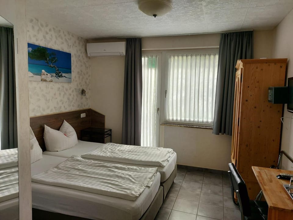 Bed, Photo of the whole room, Bedroom, hair dresser, towels, air conditioner