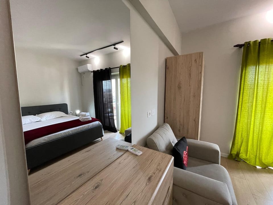 Bed, Living room, Seating area, Bedroom