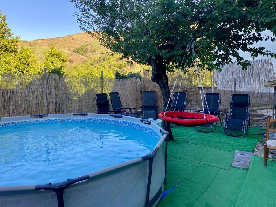 Swimming pool, sunbed