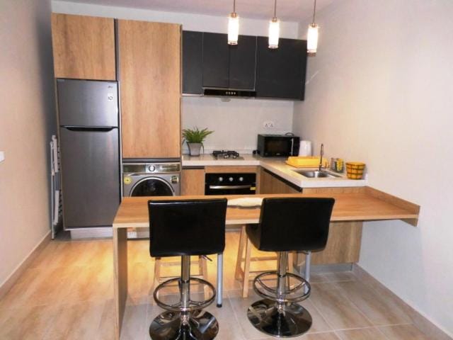 Kitchen or kitchenette, Dining area, dishwasher, minibar, oven, stove, toaster, washing machine