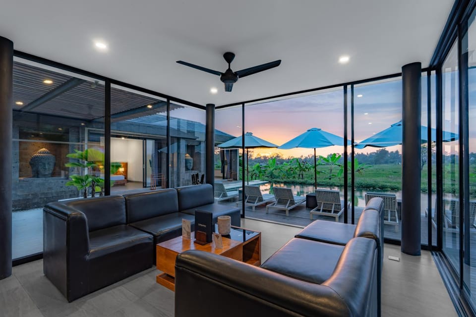 Living room, Seating area, Pool view