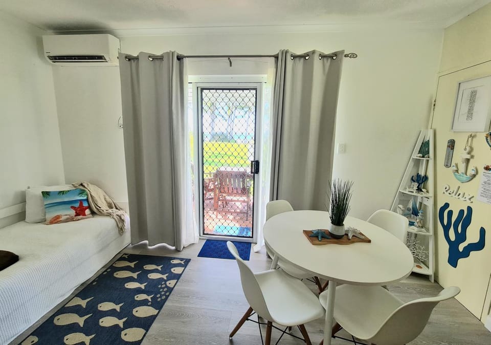 View (from property/room), Living room, Dining area, Sea view