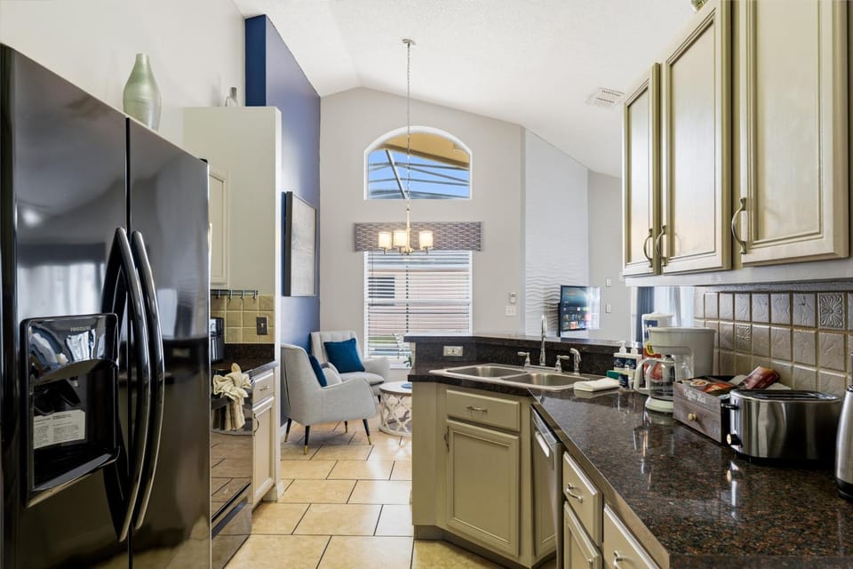 Kitchen or kitchenette, dishwasher, oven, stove