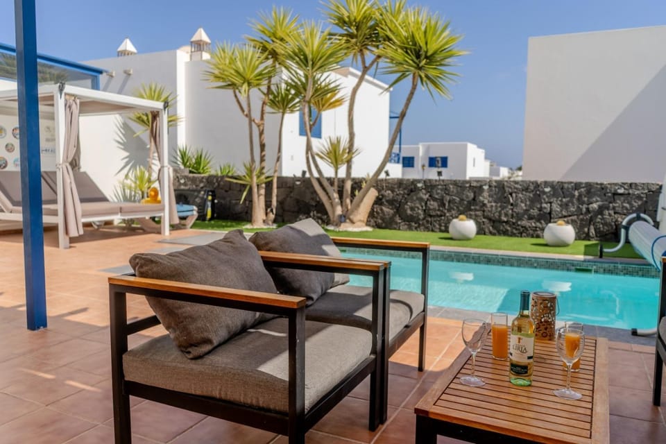 Property building, Living room, Swimming pool