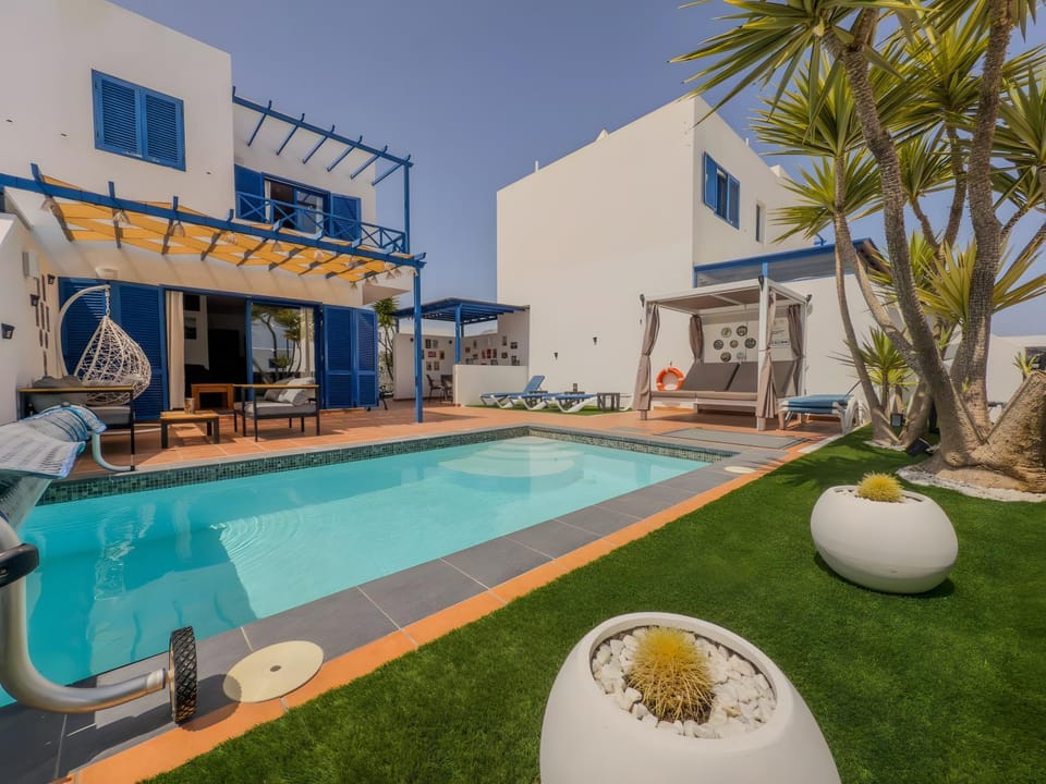 Property building, Living room, Swimming pool