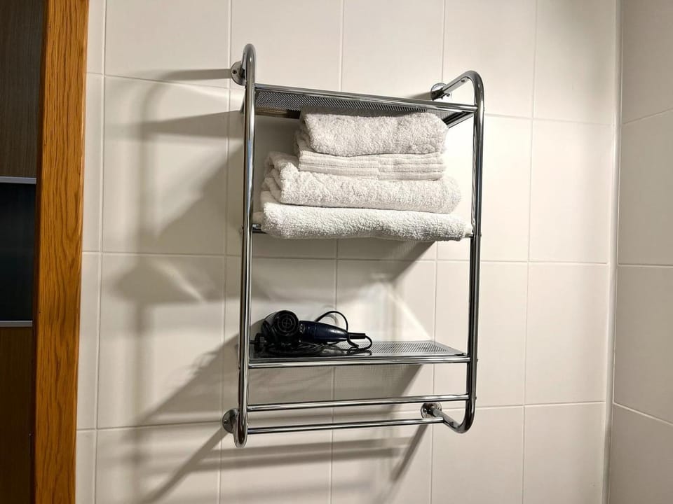 hair dryier, towels, wardrobe