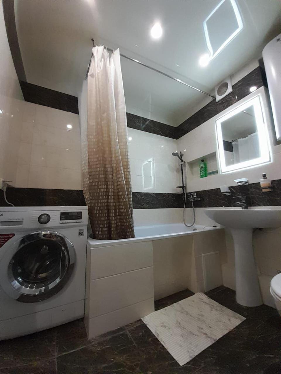 Shower, Toilet, Bathroom, towels, washing machine, dryer